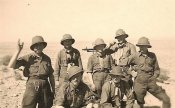 Wehrmacht_Afrika_Korps_Soldiers_with_MG34_Machine_Gun.jpg