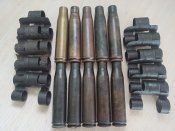 10 гильз ВЯ - 23 и 10 звеньев ленты.