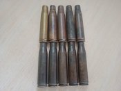 10 гильз ВЯ - 23 и 10 звеньев ленты.
