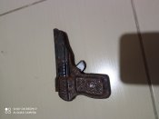 Пістолет,іграшковий на пістонах.