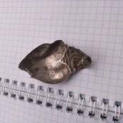 Срібна католицька підвіска.