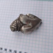Срібна католицька підвіска.