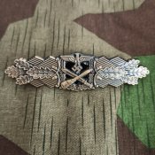 Нагрудный знак «Nahkampfspange des Heeres» III степени «в бронзе», реплика.
