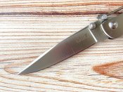 Складной нож от Columbia River Knife and Tool (CRKT). Модель Offbeat Pat Crawford (7730). Оригинал