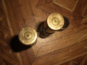 Два звена УБ 12.7 с гильзами.