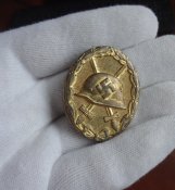 Знак "За ранение 1939" в золоте.