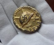 Знак "За ранение 1939" в золоте.