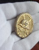 Знак "За ранение 1939" в золоте.