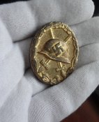 Знак "За ранение 1939" в золоте.