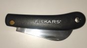 Садовый нож Fiskars.