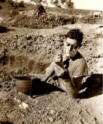 US Army soldier in his foxhole shaving.jpg