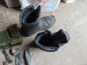 Обувь и всякое железо с позиций орков. Запчасть с подбитого БМП орков