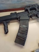Сайга-12К в тактическом обвесе