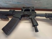 Сайга-12К в тактическом обвесе