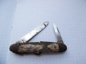 Швейцарський ножик з рекламою шампанського та ще 2 ножика