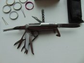 Нож с пятнадцатью функциями+всякие саперные приспособы