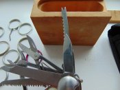 Нож с пятнадцатью функциями+всякие саперные приспособы