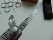 Нож с пятнадцатью функциями+всякие саперные приспособы