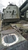 Решітка від рашистської САУ Мста-С із свастикою орків.
