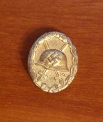 Знак "За ранение 1939" в золоте.