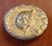 Знак "За ранение 1939" в золоте.