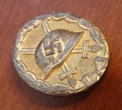 Знак "За ранение 1939" в золоте.