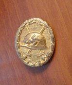 Знак "За ранение 1939" в золоте.