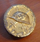 Знак "За ранение 1939" в золоте.