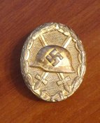 Знак "За ранение 1939" в золоте.