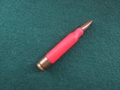 Американский опытный патрон 5,56 с пластиковой гильзой.Трассирующий