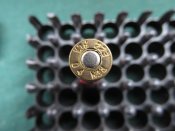 Американский опытный патрон 5,56 с пластиковой гильзой.Трассирующий