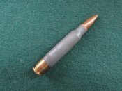 Американский опытный патрон 5,56 с пластиковой гильзой.