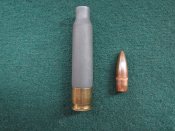 Американский опытный патрон 5,56 с пластиковой гильзой.