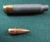 Американский опытный патрон 5,56 с пластиковой гильзой.