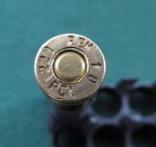 Американский опытный патрон 5,56 с пластиковой гильзой.