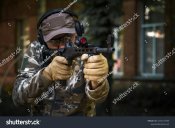 tactical-training-course-young-man-outdoor-shooting-range-shotgun.jpeg