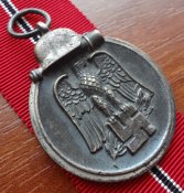 Остмедаль. Клеймо "127".