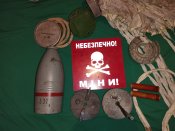 Табличка "Обережно міни" та верх 120 мм. запалювальної міни +корпус М430