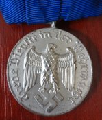 Медаль на колодке «За 4 года службы в Люфтваффе».