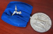 Медаль на колодке «За 4 года службы в Люфтваффе».