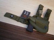 Кобура для пістолета стегнова регульована правобічна MFH 30725B, олива