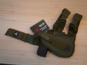 Кобура для пістолета стегнова регульована правобічна MFH 30725B, олива