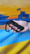 Складной нож кастет
