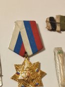 Залишок трофейного майна, россiї (40). Медалька, бинтик, сiрнички, та iнше.