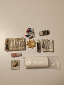 Залишок трофейного майна, россiї (40). Медалька, бинтик, сiрнички, та iнше.