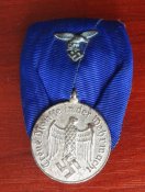 Медаль «За 4 года службы в Люфтваффе» на...