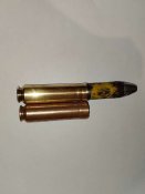ММГ и гильза от 20-мм авиационной пушки MG-FF.
