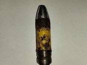 ММГ и гильза от 20-мм авиационной пушки MG-FF.