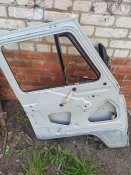 Дверь от свинособачьего УАЗа.