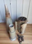 Головная часть со взрывателем, блок стабилизаторов.